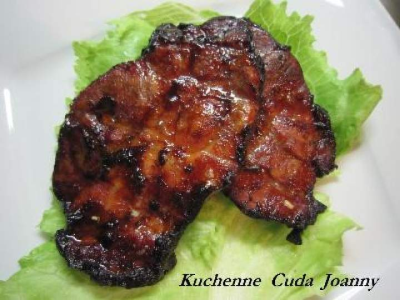 Grilled pork neck in barbecue sauce